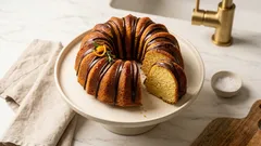 Torta bundt ai mandarini: soffice, umida e profumata, con colata di cioccolato fondente